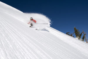 Miles Clark skiing the powder at Squaw Valley